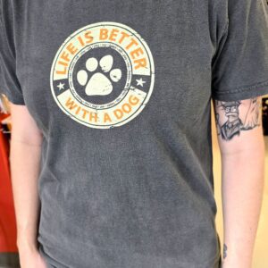 Person wearing "Life is Better With a Dog" shirt.