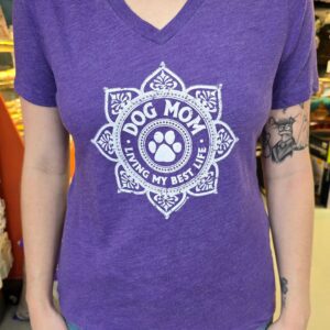 Purple "Dog Mom" shirt with paw print design.