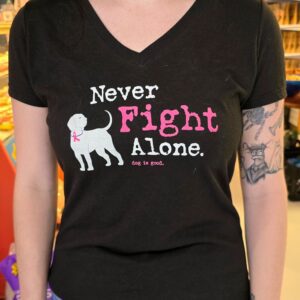 Woman wearing "Never Fight Alone" dog shirt.