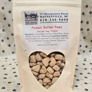 Dog treats in heart-shaped window package.