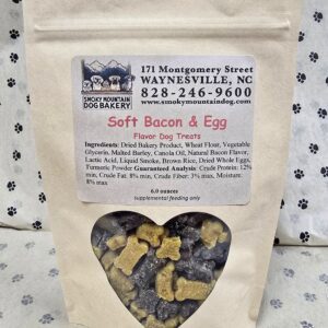 Dog treats in a heart-shaped window bag.