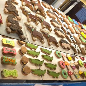 Colorful, assorted animal-shaped cookies on display.