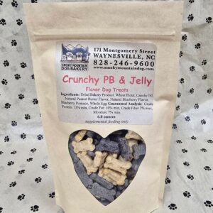 Dog treats in heart-shaped window package.