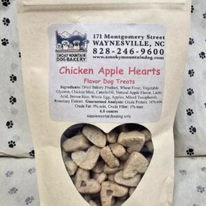 Dog treats in a heart-shaped window package.