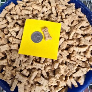 Dog treats with coin for size comparison.