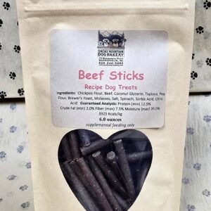 Beef sticks dog treats in heart window.