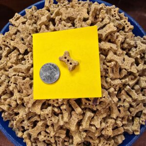 Dog treats with coin for size comparison.