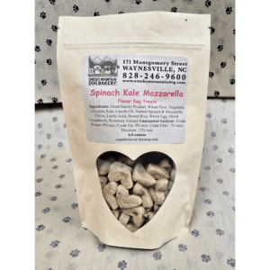 Dog treats in a heart-shaped window bag.