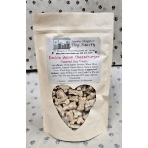 Dog treats in a heart-shaped window package.