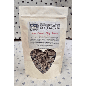 Dog treats in heart-shaped window package.