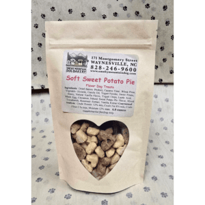 Dog treats in heart-shaped window package.